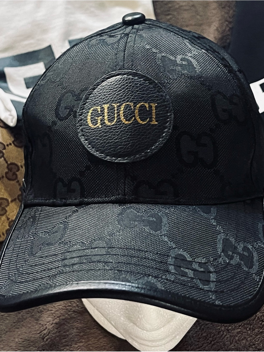 Gucci Black Cap with Gold Logo